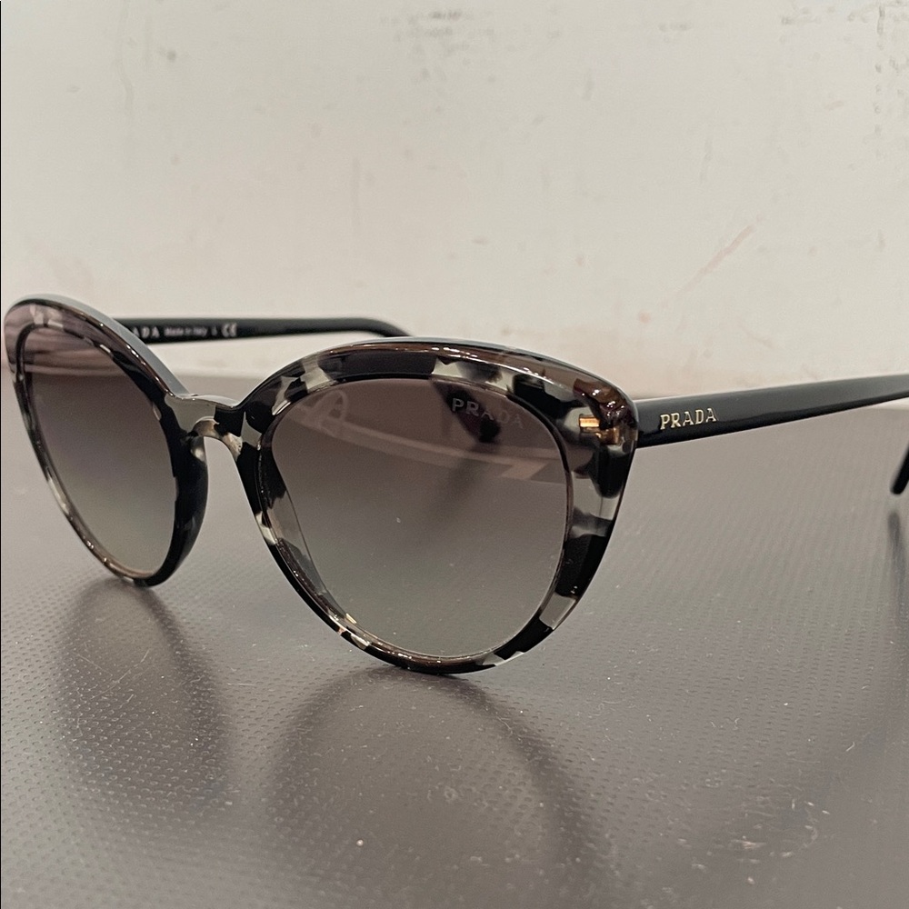 Prada Women's Sunglasses in Black and Cream